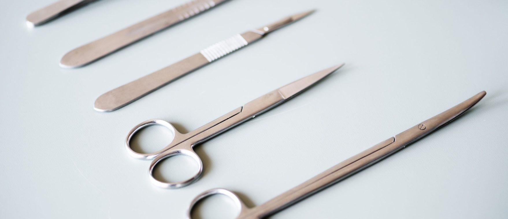Closeup of surgery knives set isolated